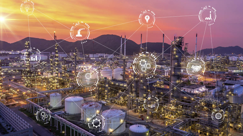 Oil refinery at twilight and night with industrial physical syst